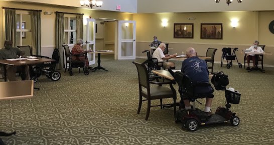Large common activity room with seating