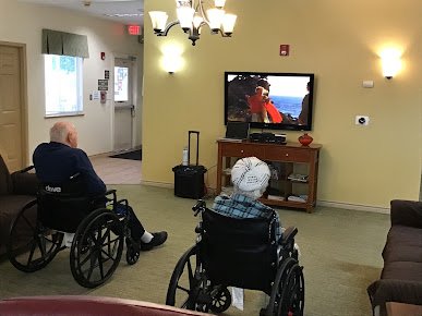 Common room with television and seating