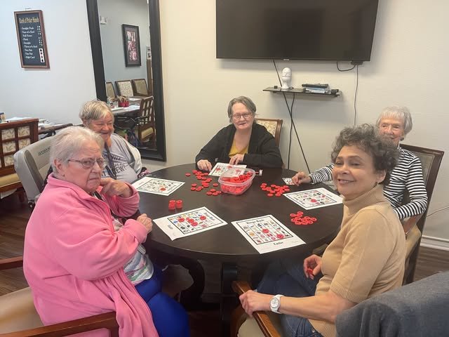 Residents playing cards together